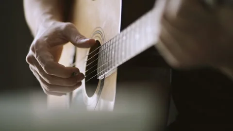 Man practicing guitar and singing song with slow motion Stock Footage 138158729