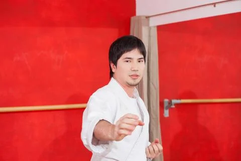 Man practicing karate Stock Photos