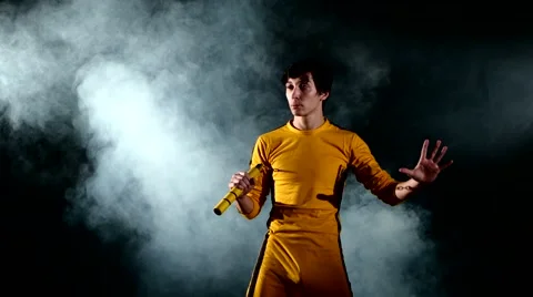 Man  practicing kung fu. Master holding nunchuck Stock Footage 50491490