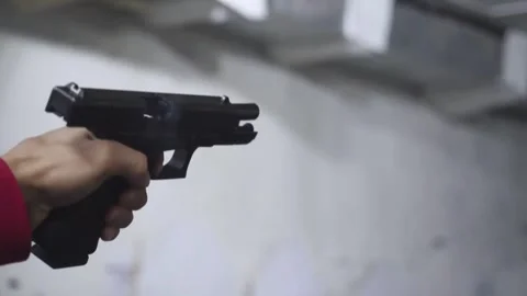 Man Practicing Pistol Shooting at Indoor Academy Range Close Up 스톡 동영상 333367231