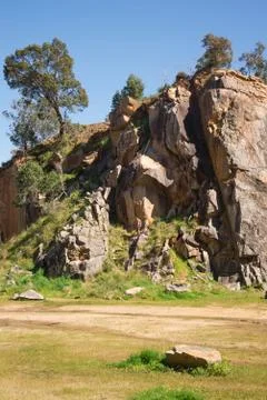 A man practicing rock climbing in a mountain quarry, Greenmount National park Stock Photos