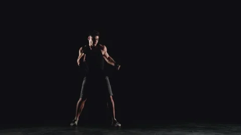 Man practicing shadow boxing Stock Footage 152116119