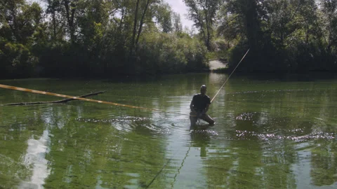 Man practicing slackline over the surface of the river 스톡 동영상 140680683