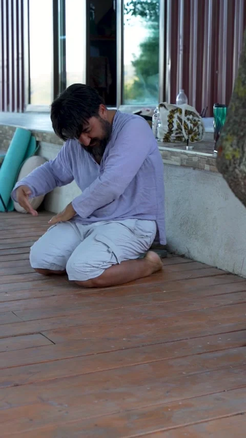 Man Practicing Yoga Dance on Floor in Izmir, Turkey, Sept 13, 2025 Stock Footage 328437668