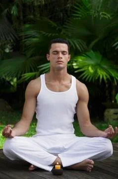 Man practicing yoga Stock Photos
