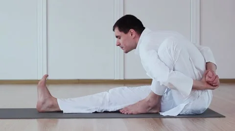 Man practicing yoga.Marichasana Stock-Footage 59729804
