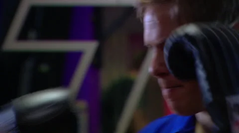 Man practising boxing technique on punch bag Stock Footage 38403001