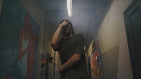 Man practising in break dancing Stock Footage 155620780