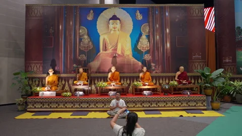 Man Pray Take Photo In Front Of Thailand Buddhist Monk Wax Figure Statues Stock-Footage 248647572
