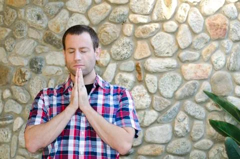 Man praying alone. Fotos de archivo