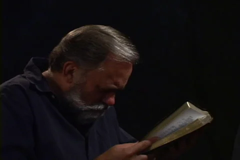 Man Praying With Bible Stock Footage 544076