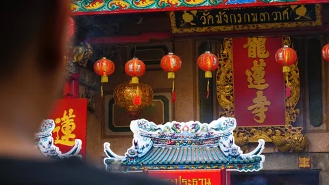 Man Praying At Chinese Temple Stock Footage 124462049