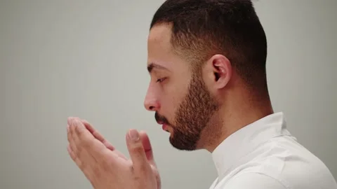 Man praying close-up, dua, islamic religion. Religious holiday Ramadan, holy Stock Footage 175390769
