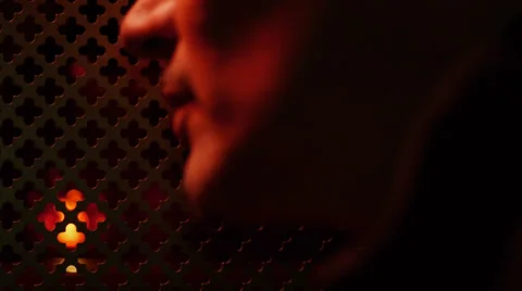 Man Praying Confessional Stock-Footage 36774878