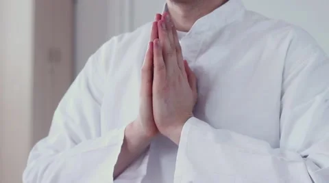 Man Praying With Hands Clasped Namaste. Ardha Padmasana Stock Footage 59729486