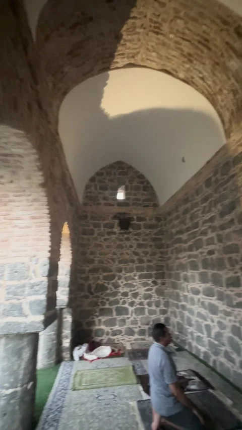 Man Praying Inside Historic Stone Al Fath Mosque Stock Footage 346191311