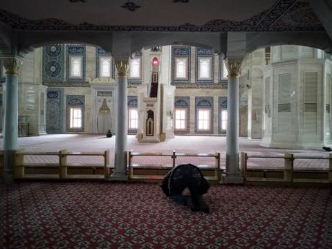 Man praying in the mosque Stock Photos
