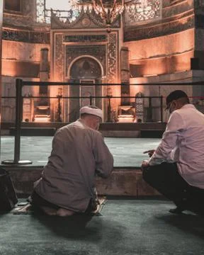 Man praying in a mosque Stock Photos