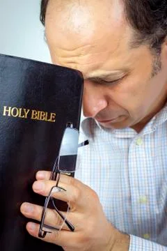 Man praying Stock Photos