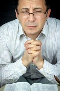 Man praying Foto stock