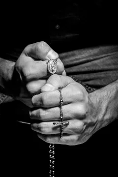 Man praying Stock Photos