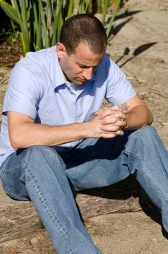 Man praying. Stock Photos