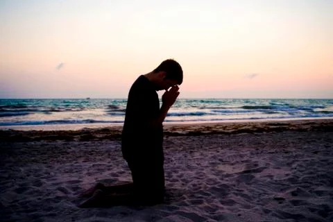 Man PRAYING Foto stock