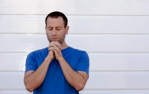 Man praying with white background. Fotos de archivo