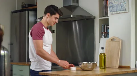 Man prepairing a healthy lunch while at home. Stock Footage 63006903
