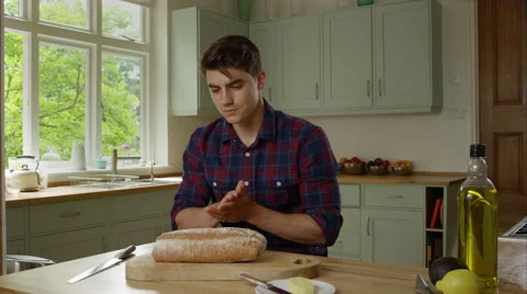 Man prepairing a healthy lunch while at home. Stock Footage 63013254