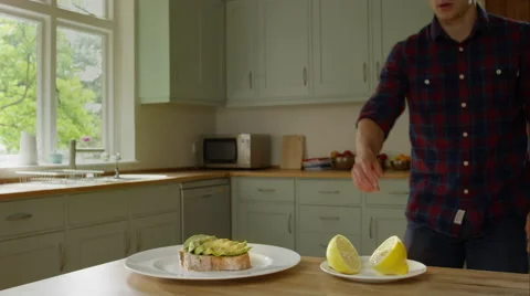 Man prepairing a healthy lunch while at home. Stock Footage 63016520