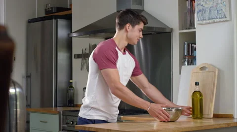 Man prepairing a healthy lunch while at home. Stock Footage 63016914