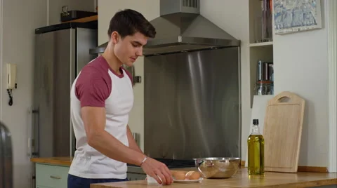 Man prepairing a healthy lunch while at home. Stock Footage 63019325