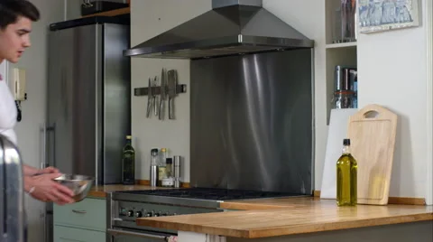 Man prepairing a healthy lunch while at home. Stock Footage 63030801