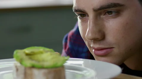 Man prepairing a healthy lunch while at home. Stock Footage 63031776