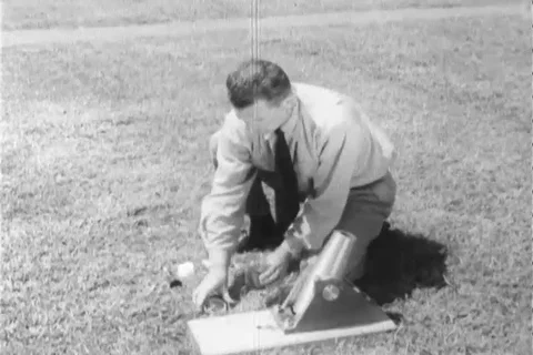 Man prepare ammunition for fire - 1960 Stock Footage 106068130