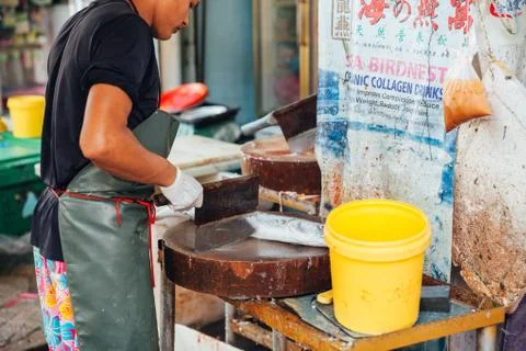 Man prepare the fish for sale Stock Photos