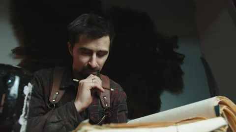 The man prepared to draw something in a notebook Video stock 167679900