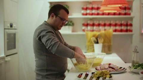 Man prepares chicken in batter Video stock 58636692