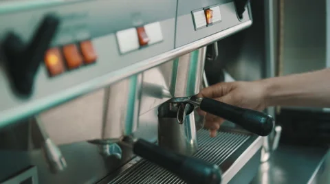 Man prepares coffee in the coffee machine Stock Footage 65105743
