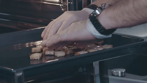 A man prepares crackers Stock Footage 103985381