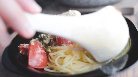 A man prepares a cream sauce Stock Footage 131495679