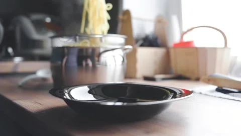 A man prepares a cream sauce Stock Footage 131495829
