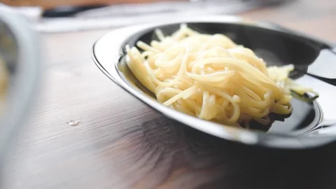 A man prepares a cream sauce Stock Footage 131495864