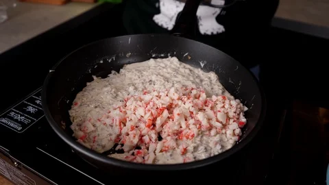 A man prepares delicious snacks Stock Footage 128633527