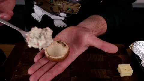 A man prepares delicious snacks Video stock 128633966