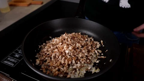 A man prepares delicious snacks Stock Footage 128634437