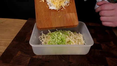 A man prepares delicious snacks Stock Footage 128634776