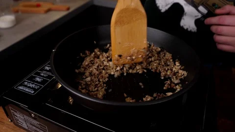 A man prepares delicious snacks Stock Footage 128634932