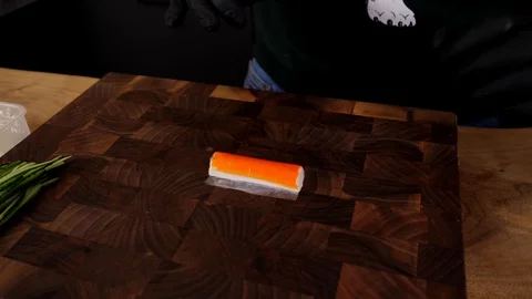 A man prepares delicious snacks Video stock 128636421